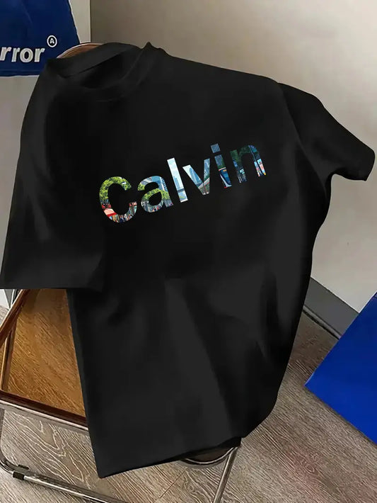 CALVIN Maglietta Casual da Uomo Nera con Grafica di Lettere Audaci - Girocollo in Poliestere Morbido per Abbigliamento Estivo Urbano, Lavabile in Macchina per l'Uso Quotidiano