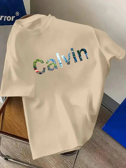 CALVIN Maglietta Casual da Uomo Nera con Grafica di Lettere Audaci - Girocollo in Poliestere Morbido per Abbigliamento Estivo Urbano, Lavabile in Macchina per l'Uso Quotidiano